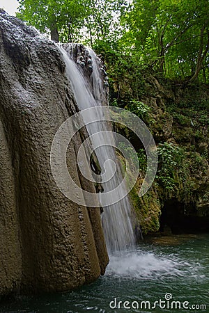 Longexposure photography of waterfall in forest Stock Photo