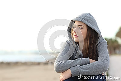 Longing pensive teenager looking away Stock Photo