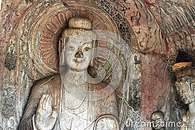 Longmen Grottoes with Buddha`s figures are Starting with the Northern Wei Dynasty in 493 AD. It is one of the four notable Stock Photo