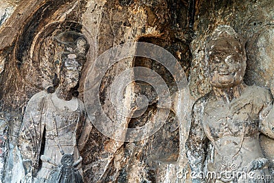 Statues in Longmen Grottoes, Luoyang, Henan, China Stock Photo