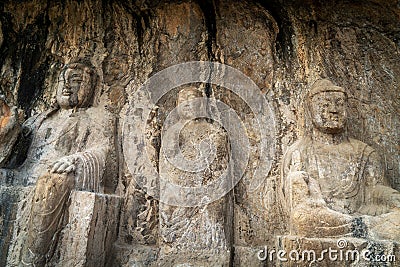 Longmen Grottoes with Buddha`s figures are Starting with the Northern Wei Dynasty in 493 AD. It is one of the four notable Stock Photo