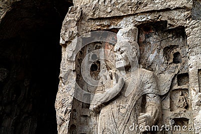 Longmen Grottoes with Buddha`s figures are Starting with the Northern Wei Dynasty in 493 AD. It is one of the four notable Stock Photo