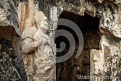 Longmen Grottoes with Buddha`s figures are Starting with the Northern Wei Dynasty in 493 AD. It is one of the four notable Stock Photo