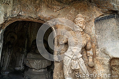 Longmen Grottoes with Buddha`s figures are Starting with the Northern Wei Dynasty in 493 AD. It is one of the four notable Stock Photo