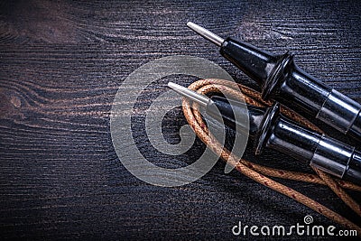 Longstanding electrical tester on wooden surface electricity con Stock Photo