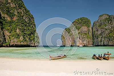 Longtail boats anchored at Maya Bay on Phi Phi Leh Island, Krabi Province, Thailand Stock Photo