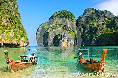 Longtail boats anchored at Maya Bay on Phi Phi Leh Island, Krabi Province, Thailand Stock Photo