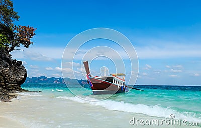 Longtail boats on the beach in thailand Stock Photo