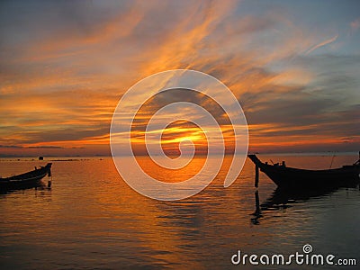 Longtail boats sunset thailand Stock Photo