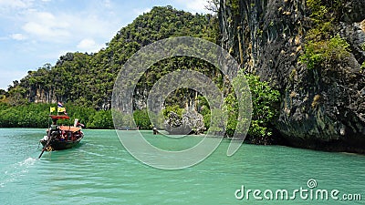 Longtailboat in lagoon Editorial Stock Photo