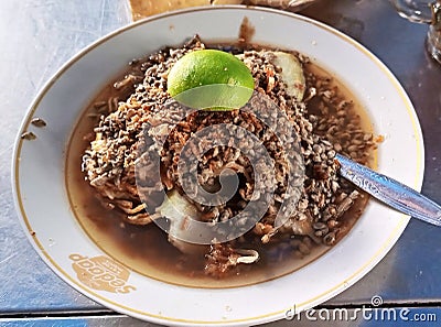 Lontong Kupang - a traditional coastal food made from small marine animals Stock Photo