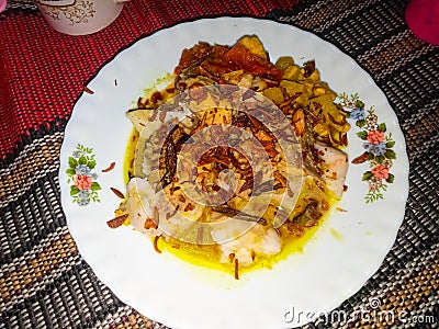 lontong opor ayam, Indonesian dish served on a plate Stock Photo