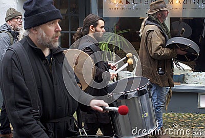 Looe, Cornwall, UK, February 16, 2019. Mixed group of `Extinction Rebellion` protesters, marching through the Cornish town of Looe Editorial Stock Photo