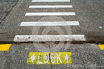 Look Both Ways at a Pedestrian Crosswalk Stock Photo