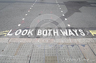 Look both ways sign pedestrian crossing London UK Stock Photo