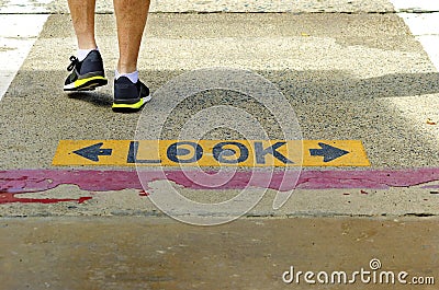 Look crossing sign Stock Photo