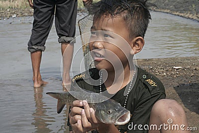 look for fish in the river Editorial Stock Photo