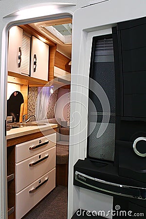 A look inside of interior of Hobby Excellent 540 modern campervan with kitchen, drawers and sofa in background Editorial Stock Photo