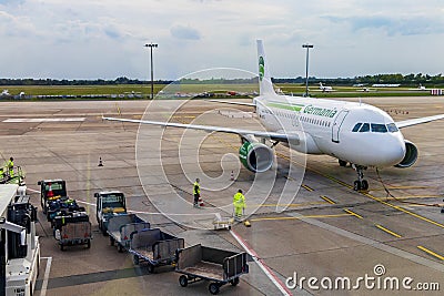 Look out of the airport window at airfield. Germania Airlines Editorial Stock Photo