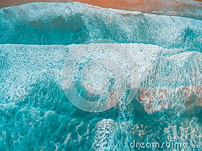 Looking down at crushing powerful ocean waves. Stock Photo