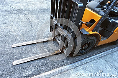 Close up of fork lift blades on an urban city street Stock Photo