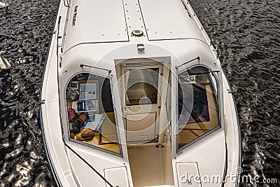 Top down view of a holiday boat on the River Bure, Wroxham, Norfolk, UK Editorial Stock Photo