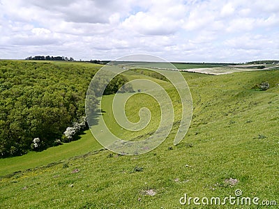 Looking down hill into valley below Stock Photo