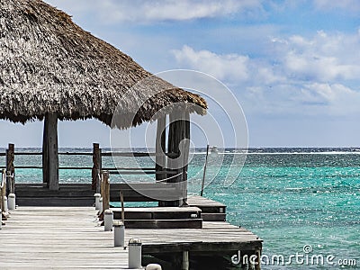 Looking down a long dock on the beach in san pedro Stock Photo