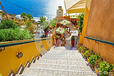 Staircase to restaurant terrace on Caldera cliff edge Santorini island Greece Editorial Stock Photo