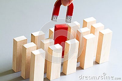 Looking for an employee abstract business recruitment concept with magnet Stock Photo