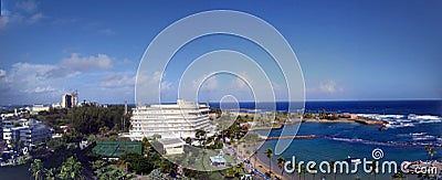 Looking At Fancy Hotel Grounds and beach featuring a water trampoline Editorial Stock Photo