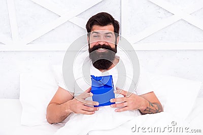 Looking good. early morning surprise. start day with birthday greeting. gift for spent night. bearded man spend holiday Stock Photo