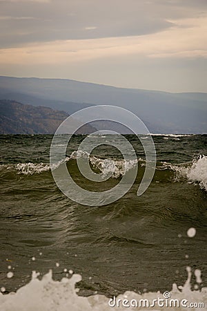 Looking out at cresting waves in a windy storm Stock Photo