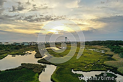 Aerial view of Davis creek at Oak Island NC. Flying over the boardwalk and the wet marsh. Stock Photo