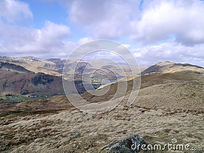 Looking over rolling hills down to Ullswater, Lake District Stock Photo