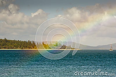 Looking at a rainbow from Tropical Daydream Island Stock Photo