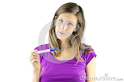 Looking sad at negative pregnancy test Stock Photo