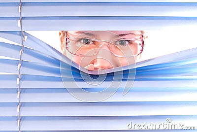 Looking trough blinds. Stock Photo