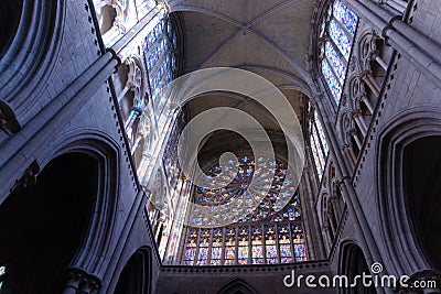 Looking up at arched ceilings and stained glass arches in French cathedral in Saint-Malo France, Saint VIncent of Saint-Malo Editorial Stock Photo