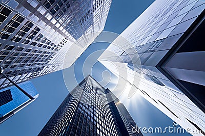 Looking up at business buildings Stock Photo