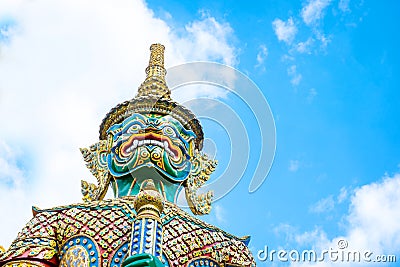 Looking up at giant statue at Grand palace, Temple of the Emerald Buddha (Wat pra kaew) in Bangkok ,Thailand. Stock Photo