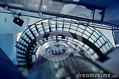 Looking up at modern glass stairway Stock Photo