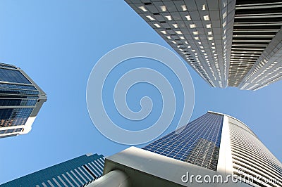 Looking up at office buildings Stock Photo