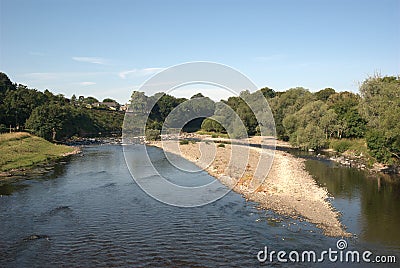 looking up river Tweed at Melrose from chainbridge in summer Stock Photo