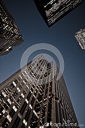 Looking up at skyscrapers Stock Photo