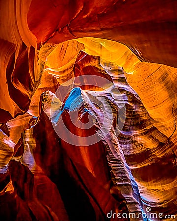 Looking up at the smooth curved Red Navajo Sandstone walls of the Upper Antelope Canyon Stock Photo