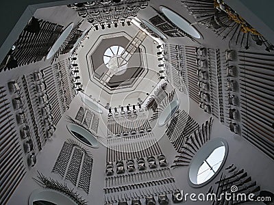 Looking up the stairwell with arms on the walls the armouries Leeds Yorkshire England Editorial Stock Photo