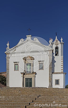 Looking up the steps towards the Paroquia de S Martinho in the small Algarve Town of Estoi. Stock Photo