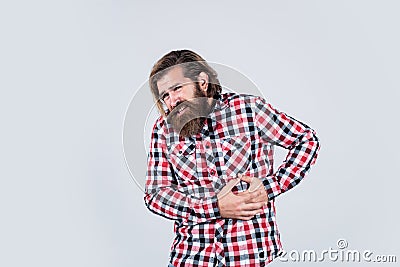 Looking very bad. bearded man wear checkered shirt. brutal man feeling pain. male health care. pain in heart. mature Stock Photo