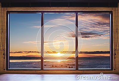 Looking through window in the morning sunrise, wooden window frame with desk Stock Photo